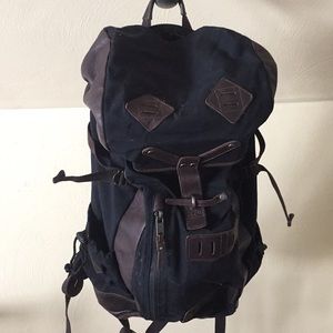 Black Canvas and Brown leather backpack.